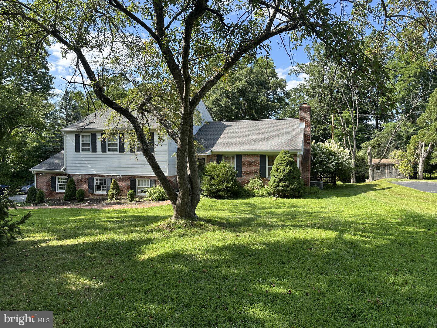 Buffered by preserved parkland and set at the corner of Contention Lane, this renovated Devon home enjoys rare quiet, treetop views, and a secluded backyard deck. Upgraded granite kitchen with mid-island addition, newer furnace and AC HVAC central force-air, 2-car garage, and close proximity to T/E schools and Valley Forge. Inside, sunlight filters through generous windows into a spacious main living area with mid-century proportions and hardwood floors. Upstairs includes three well-sized bedrooms and two updated bathrooms, while downstairs includes a large den, powder room, laundry area, and direct access to a private lower patio. The oversized two-car garage connects to a wide driveway with ample parking. As the last home on the street before coldstream creek with a close proximity to the new chester valley trail system, the property combines privacy, nature, and neighborhood living in one of the Main Line’s most cherished townships.