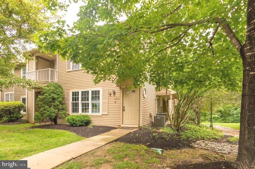 Rare opportunity to own a beautifully maintained second-floor end unit offering 2 bedrooms, 2 full baths, and a spacious loft, ideally situated in the back of the community backing to peaceful trees and open space.

The main living area features a dramatic cathedral ceiling with skylights, filling the home with natural light. The recently remodeled kitchen offers granite countertops, wood cabinetry, and newer stainless steel appliances, opening to the dining area and expansive living room. Just off the living room, sliding doors lead to a private deck overlooking the common area, complete with an adjoining storage closet.

The main level also includes two generously sized bedrooms, two updated full baths, a laundry/utility room, and abundant closet space throughout. Upstairs, the oversized loft overlooks the living room below and provides endless possibilities—perfect for a home office, gym, guest space, or bonus room. The wrought iron and wood railing add to the home’s open and inviting feel.

Additional highlights include a newer hot water heater, central air, and gas heater. This move-in ready home also comes with a one-year home warranty for added peace of mind.

Enjoy plenty of parking and fantastic community amenities including a recreation center, pool, tennis courts, basketball courts, and community room. A tremendous value in a quiet, desirable location.