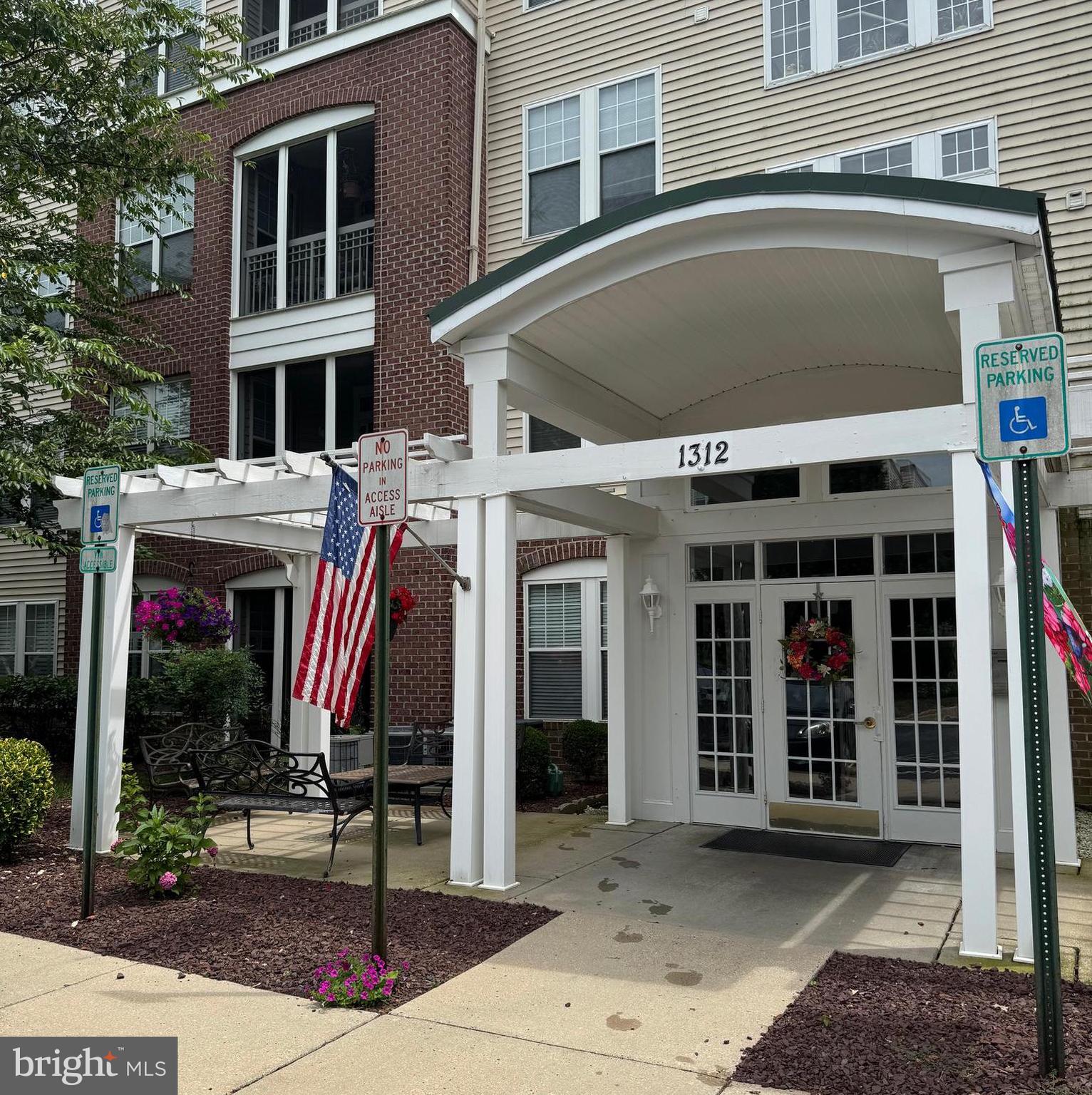 Must see this corner unit on the second floor to appreciate all the windows! Lots of natural light and your own screened in porch to enjoy your morning beverage. The open concept gives a spacious feel, especially if you are downsizing from a larger home. Both bedrooms are a good size and both bathrooms. A walk-in closet and another closet in the primary bedroom. There is a formal dining area that is open to the formal living room and there is a bright & sunny kitchen eating area that is open to a family room. The pantry/laundry area is good for storage, plus there is storage in the kitchen island as well. You will not feel cramped in this well-designed condo. Accessibility features include a cut-out curb at the entrance to the building and direct access to the elevator and to your unit. There is now a special assessment of $66.00 per month paid separate from the condo fee to increase reserve funds for future concerns. This is a 10 yr. commitment to your community.
Please NOTE: Condo fee of $365. per month is paid up through the end of the year-2025. The $66.00 month assessment is paid up through June 2026. Hopefully this should help with changing out the carpet.