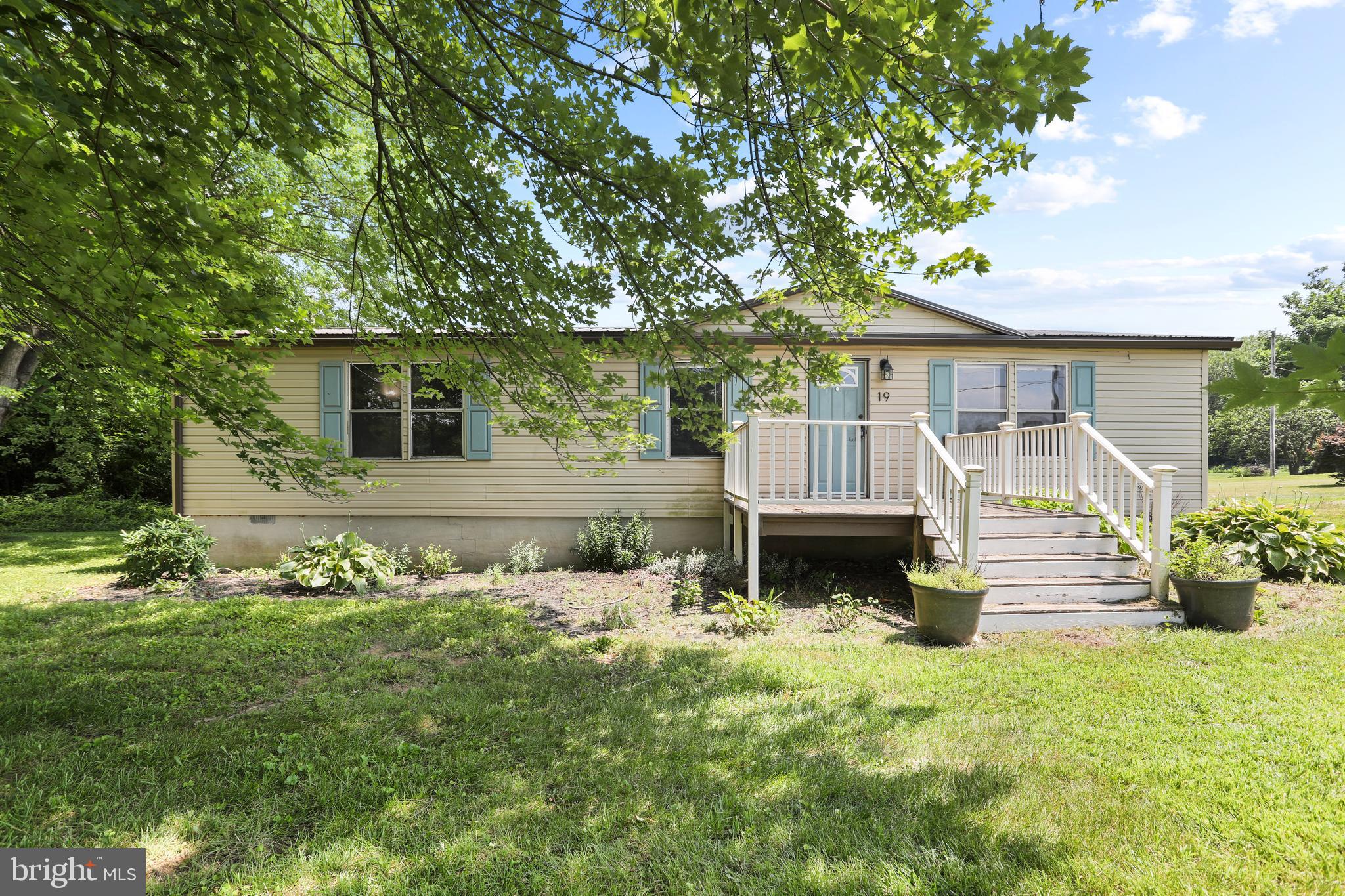 Wow- just WOW! This 3 bedroom, 2 full bath, well loved home sits on over 2 acres of unrestricted FLAT land, and in a fantastic location! This home just needs a fresh coat of paint, and updated to taste! Inside, you will see a semi-open concept featuring a large living room, eat-in dining room, suitable kitchen, large laundry room, and three amble sized bedrooms. The ensuite in the primary bedroom features a spacious soak-in tub. Your outside living just got so much more enjoyable with this massive backyard! Whether you want to add a pool, a large garage, a trampoline or just host a large gathering for friends and family- you have all the room you need! Located in the highly sought-after Falling Waters district and close to all major commuting routes!