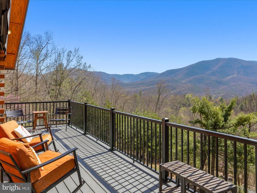 GREAT BUY!!! NOW INCLUDES 27 ACRES AT SAME PRICE! NEW SURVEY PLAT AVAILABLE!
Welcome to Wild and Wonderful West Virginia—where the air is fresh, the views are breathtaking, and the lifestyle is unmatched. Whether this is your first time experiencing the charm of the Mountain State or you're finally ready to make it your home, 810 Dumpling Run Road is the kind of property that immediately enriches your life. This stunning three-level, 2,850 square foot cabin was constructed to shell-condition in 1998 then lovingly transformed in 2016 by its current owners into a mountain retreat that perfectly balances rustic elegance and modern convenience. Inside, you'll find four spacious bedrooms and two and a half beautifully finished bathrooms, as well as DECO mesh Wi-Fi for seamless connectivity. The top floor features two large, light-filled bedrooms, a shared bathroom, and a cozy loft workspace ideal for reading, remote work, or simply enjoying the view. The main level boasts an open-concept living and dining area anchored by a striking staircase built from trees harvested directly from the property. The kitchen is warm and functional with butcher block countertops, a generous sink, and an adjacent pantry. A laundry area with built-in storage and a convenient half bath round out the main floor. Step out onto the deck and prepare to be amazed by sweeping mountain views—on a clear day, you can even spot Virginia off in the distance. The lower level offers two additional spacious bedrooms, a full bathroom, a walk-out entrance, a utility room, and a workshop cleverly positioned just off the media room. This home is filled with thoughtful details, including luxury vinyl plank flooring, a new standing seam metal roof, fresh paint, and recently restored log exterior siding that’s been sanded, stained, and sealed for lasting beauty. Comfort is ensured year-round with a Carrier eight-stage HVAC system that’s Wi-Fi enabled, along with two mini-splits in the upstairs bedrooms with remote controls for customized climate control. Outside, there are two generous decks, a gas grill, and even a hidden pond where you can enjoy the peaceful chorus of springtime peepers. The property runs on pristine West Virginia mountain water, filtered through a five-stage whole-house system. The owned 500-gallon propane tank, which typically costs only $900 to refill every two years, supplies the gas fireplace, outside grill, kitchen cooktop, and tankless water heater. There is a 30'x 20' sq ft 2 car garage convenient for storage and or parking. This is more than just a home—it’s a peaceful, private, and beautifully crafted retreat in the heart of the mountains. Whether you're looking for a full-time residence, a weekend escape, or a legacy property to share with family and friends, 810 Dumpling Run Road is ready to welcome you home. Included in sale: 1982 Ford 1700 4-wheel drive diesel tractor, 2013 John Deere 625i. Located only 2 hours from Dulles Airport, 45 minutes from Wardensville, WV and 20 minutes to the nearest town with medical services, restaurants, shopping and conveniences stores.  Make an appointment today! *Additionally check out MLS#  WVHD2002688* New Septic Field in 2025, 12 circuit emergency generator included, most furnishings convey!