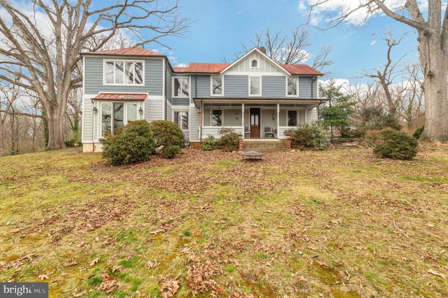 THIS EXTRAORDINARY PROPERTY IS A MUST SEE!! ALMOST 3 ACRES ZONED R-3 (3 DU/AC) INSIDE THE BELTWAY WITH HOLMES RUN STREAM RUNNING THRU IT---- DEVELOPMENT POTENTIAL WITH UTILITIES AT THE STREET...  The original house has been totally remodeled and probably dates back to the late 1800's. This home features the following: gourmet kitchen with custom cabinets, granite countertops, stainless steel appliances, custom woodwork, hardwood and tile floors, wood burning fireplace in family room, large primary suite with designer primary bath, custom closet in primary, new windows and doors, 2 car detached garage, wood shop, AND SO MUCH MORE....