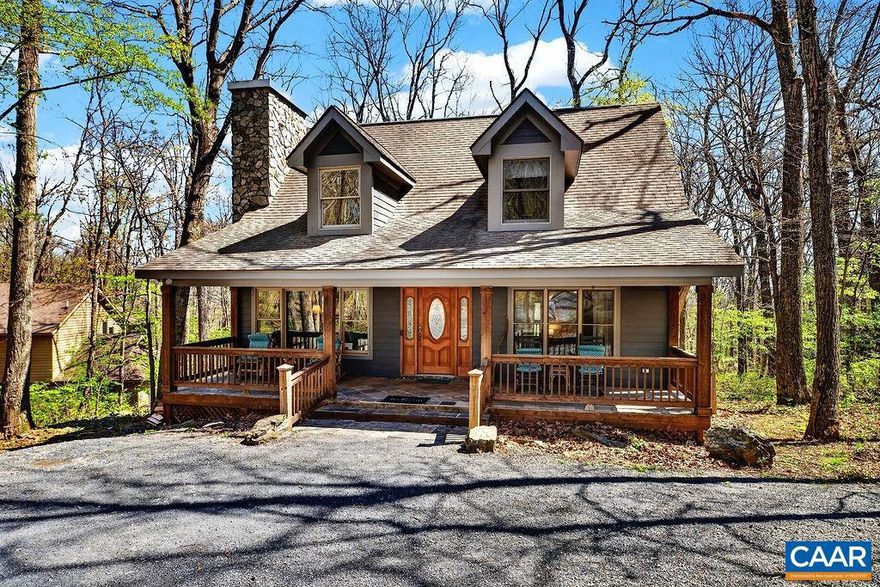 This charming mountain house has been a successful rental and family vacation spot for the current owners, averaging $30K gross annually. This home features only two steps to enter, Brazilian soap stone counter tops in the kitchen and Travertine stone floors throughout, vaulted ceilings, wood burning FP, and natural wood accents. Spacious layout w/ 5 bdrms, 4 baths, a LR & Den on separate levels and two large porches to enjoy the Blue Ridge. Its recently had all new interior paint throughout, well maintained and tastefully furnished and decorated. Located a short distance to Chestnut Springs pool, Shamokin Springs Nature Preserve and hiking trails. Conveys fully furnished and ready to enjoy.,Soapstone Counter,Fireplace in Living Room