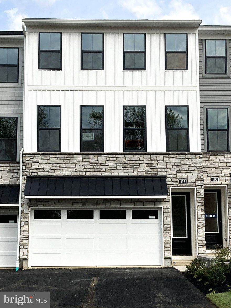 This home is currently under-construction.

This home features a thoughtfully designed three-level layout created for both comfort and everyday living. The entry level includes a welcoming foyer, a versatile flex room ideal for a home office or lounge, a full bath, and access to the garage for added convenience.

The main living level showcases an open-concept design with a spacious great room and a bright casual dining area that connect seamlessly to the kitchen. The kitchen is styled with white and hazelnut cabinetry, quartz countertops, an upgraded tile backsplash, satin nickel finishes, and KitchenAid appliances. Luxury vinyl plank flooring extends throughout the main living areas, enhancing the home’s clean, modern aesthetic.

On the third floor, the primary suite offers a private retreat with dual walk-in closets and a well-appointed bath featuring upgraded tile and contemporary finishes. Two secondary bedrooms share a full hall bath. Additional highlights include bedroom-level laundry and a layout designed to support today’s lifestyle.