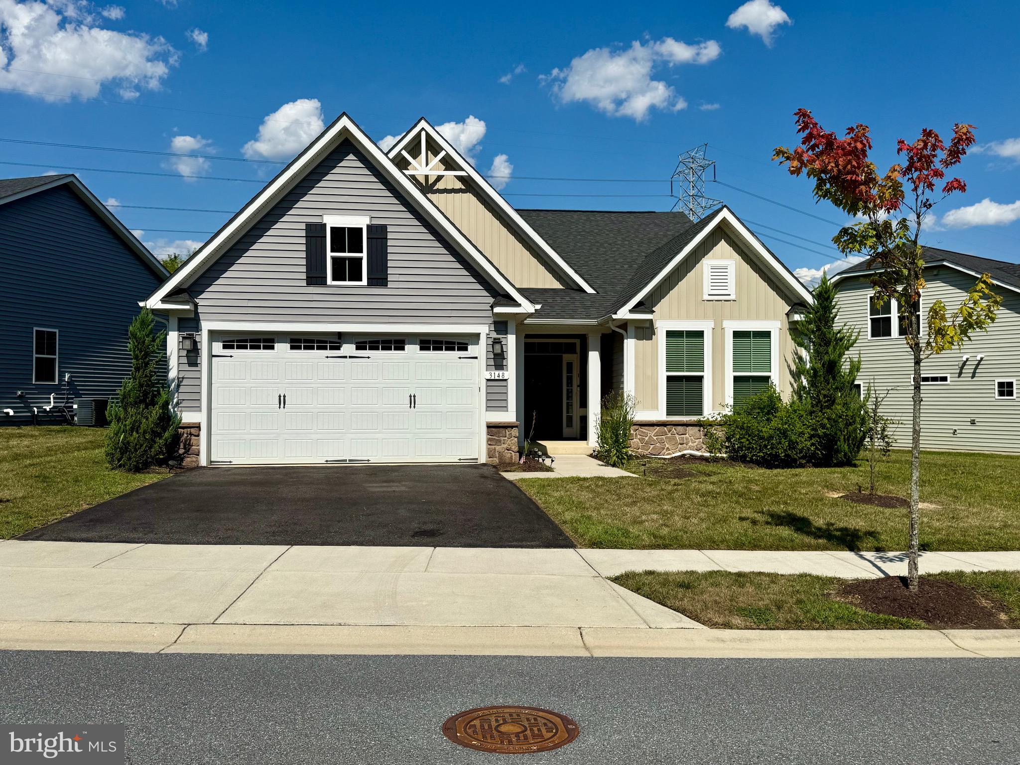Welcome to Twin Rivers! This elegant 55+ community in Odenton is one you don't want to miss! This stunning rambler offers the perfect blend of comfort and style with its open-concept design and soaring vaulted ceilings. The main level boasts a large living room, dining area, a well-appointed kitchen, a private study, and a guest bedroom. The luxurious primary suite features a cozy sitting area, a spa-like bath, and an expansive walk-in closet.
Upstairs, you’ll find a bonus loft retreat complete with a bedroom and full bath—ideal for guests or hobbies. Enjoy outdoor living on the screened-in patio overlooking a level lot and take advantage of the convenience of a two-car garage.
Located in a vibrant community with amenities tailored to active adults, this home offers both elegance and ease. Enjoy the indoor/outdoor pool, tennis courts, gym and clubhouse at your leisure. Don’t miss your chance to experience this exceptional property!