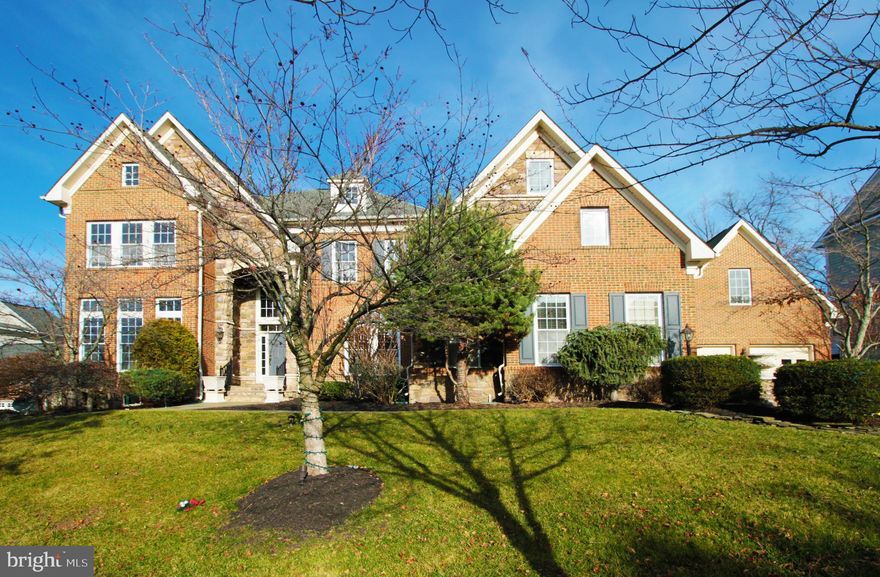 Welcome to this magnificent  Lansdowne estate with exquisite architecture and luxury living come together with rare available FOUR CAR GARAGE.  Boasting with every optional extension with over 9,000 sq ft, this residence offers an unparalleled level of comfort and sophistications in luxury living.  The enormous open floor plan  with 10 foot high ceilings and endless windows with abundant natural lights is ideal for large gatherings.  Our reception starts with  a  stunning 2 story foyer with an elegant curved staircases with wrought iron railing details. The elegant center hall  and  an oversized formal dinning room are ready for entertaining,  A well appointed formal library is  ideal for private meetings. The timeless interior features continue on the main level with gorgeous Exotic Brazilian hardwoods and 10 foot ceilings throughout.  Next comes the  elegant living room with Juliet Balcony access and the grand family room featuring floor to ceiling windows and gas fireplace. A large breakfast room is in adjacent to the rear sunroom with panoramic windows and french doors with transom accessing the large deck.  Opening to the grand family room is the Chef's gourmet  kitchen with  top-of-the-line Wolf 42" PRO Island Hood over the grand center island with contrast cabinetry and pendant lighting in addition to the rich cherry cabinets, a Butler's pantry, High-End SS Appliances, planning desk with organizers.  This home comes with   TWO HUGE OWNER'S SUITES, one on main level with  a grand sitting room facing the wooded back yard that gives you beautiful breathtaking seasonal views.  Ascending to the upper level  from the elegantly curved staircase is the luxury 2nd owner's suite that is huge  and with tray ceilings and large separate sitting area.  The sumptuous owners bath and soaking tub is enormous to enjoy.  Two additional large ensuite bedrooms complete the top floor living.  Coming to the lower level is the enormous walk-up finished  basement with two large recreational  areas. It is perfect for relaxation and entertaining large group of guests for billiards, games while enjoying at the fully equipped wet bar includes wine racks., dishwasher and sink. Workout in the second den/gym,  There are additional finished rooms to turn into medium room,  craft room in addition to an huge  AuPair /guest suite and full bath . Three additional huge unfinished areas provide you more spaces for storage. Lists of recent years upgrades includes: Front Loading Washer & Dryer(2018), Main level Owner's Suite and entire upper level carpet with upgraded padding(2019) Uppwer Level HVAC Unit Carrier iCormfort thermsdat (2019) Gas Water Heater(2021) All 4 Garage Doors(2016)
Outside,  this residence boasts  exceptional architecture design  of a spacious motor court and driveway, stately lighted brick entrance pillars.  A large maintenance free trex deck with stairs to huge lower level custom stone patio surrounded by the stunning outdoor oasis with an outdoor built in fire pit and outdoor lighting for entertaining and luxurious retreat.  Oh there is also the outdoor sprinkler system  for your beautiful  lawn care.  This place is a true gem for stylish and peaceful living.
Community members enjoy access to the Potomac Club which offers indoor/outdoor pools, tennis, billiards and event planning spaces for parties and entertainment. Landsdowne Resort offers golf memberships on 3 courses.  Historic Leesburg and Leesburg Premium outlet is only minutes away.