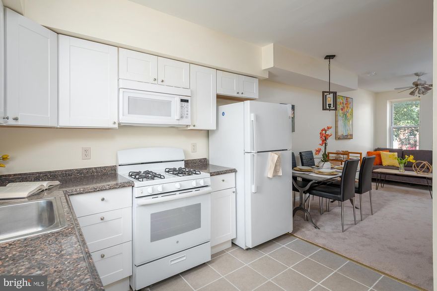 ENCHANTING MOVE IN READY PATTERSON PARK ROWHOME WITH 3 FINISHED LEVELS!  The main level features an inviting living room with a dining area, a Chef's kitchen with ample cabinet space, 2nd level den and spacious bedroom with a full bath, 3rd level with 2 additional bedrooms and 1 full bath, an unfinished basement that is perfect for storage and a rear yard with a private patio and a large fenced yard!  Conveniently located close to Johns Hopkins and Patterson Park!