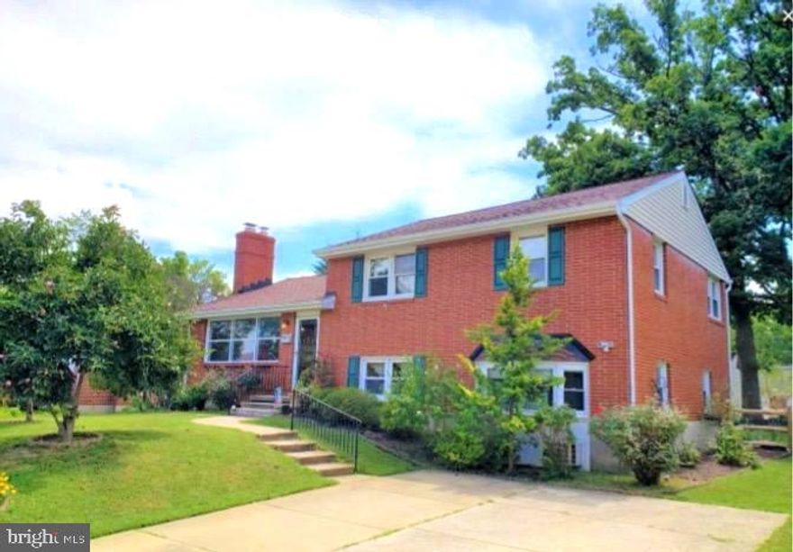 THIS WONDERFUL  4 BEDROOM/3 BATH ALL BRICK PROPERTY IS CONVENIENTLY LOCATED IN LUTHERVILLE-TIMONIUM.  THIS  4 LEVEL SPLIT HOME/PROPERTY WITH ITS GLEAMING HARDWOOD FLOORS, MANY UPDATES THROUGHOUT AND FLEXIBLE FLOOR PLAN IS A MUST SEE!!!  LARGE UPDATED KITCHEN WITH GRANITE COUNTER TOPS, STAINLESS APPLIANCES AND JEN AIR COOK TOP  IS A HIT FOR ENTERTAINING!!!   DINING ROOM OFF KITCHEN.  GOOD SIZED LIVING ROOM WITH WOOD BURNING FIREPLACE.  UPDATED BATHROOMS. (ONE WITH JACUZZI TUB).   2 MASTER BEDROOMS.  1 IN LOWER LEVEL COULD ALSO BE USED FOR EXTRA REC ROOM).  THIS HOME IS IDEAL FOR LARGE FAMILY - MUCH LARGER THAN IT APPEARS!  BOTH LOWER LEVELS HAVE WALK-OUT DOORS TO NICE SIZED LOT WITH SHED AND ADDITIONAL OUTBUILDING - IDEAL FOR A STUDIO, HOME OFFICE, DAY CARE.  OUTBUILDING HAS A KITCHEN AND PLENTY OF SPACE FOR POSSIBLE IN-LAW SUITE.  THE PROPERTY IS UNIQUE - YOU WILL FALL IN LOVE WITH IT - UNLIMITED POSSIBILITIES!!!