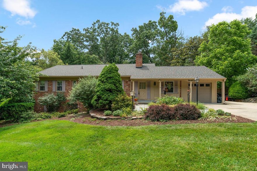 Welcome home to this spacious rambler nestled in paradise!! You won't believe the HUGE sun room!! This home also features not one, but TWO wood burning fireplaces! Main level includes living room, dining room, kitchen with breakfast nook, sun room, spacious owner's suite, plus two additional bedrooms and full bath! The fully finished walkout level basement includes fantastic rec room, 4th bedroom, full bath, and utility/storage room. Retreat to your private backyard oasis complete with deck, patio, pond and luscious gardens filled with gorgeous azaleas! Recently replaced roof! Don't miss this one!!