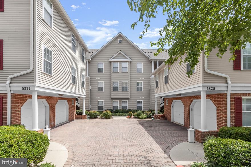 Welcome to this beautiful top-floor condo unit offering spacious interiors, low-maintenance living, and a convenient commuter location in the heart of Columbia!  High ceilings, neutral color palette, and light-filled lofty windows overlooking lush foliage are a few of the outstanding features awaiting you. As you step inside, you are greeted by the open-concept floor plan seamlessly connecting the living, dining, and kitchen areas, creating a spacious and inviting atmosphere. As an upper unit, you are ensured of no overhead noise. The generously sized living and dining room combination is ideal for entertaining and everyday comfort and is characterized by a cathedral ceiling and cozy fireplace. Prepare your favorite recipes in the kitchen boasting white cabinetry, a breakfast area with a bump-out window, and stainless steel appliances. Comfort comes easy in the primary bedroom highlighting a decadent tray ceiling, dual closets, and an en-suite bath with a double vanity, soaking tub, and separate shower. Two additional generously sized bedrooms and full bath conclude the living areas of the home. Sip your morning coffee from the deck with privacy and shade from mature trees. Laundry room off the kitchen. Unassigned parking lot with ample spaces. Water, sewer, and trash collection are included in the condo fee. Close proximity to schools, downtown Columbia, The Mall in Columbia, and a multitude of shopping, dining, and entertainment options. Easy access to commuter routes including US-29, I-95, and MD-32.