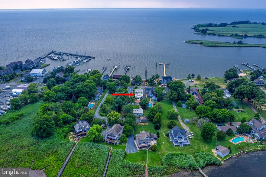 Definition of Superior Quality:  Excellent of its kind.    Now build a house... one Excellent of its kind: 
Would it include HardiPlank siding, a sophisticated geothermal heating/cooling system, standing seam metal roof, maintenance free decking, insulated basement/crawlspace and bathed in natural light?
Possibly it has a carriage house with a sauna, garage, additional storage space, and new heat pump?
Now imagine this - you just walked back from dinner, dusk is just settling in...  with nightcap in hand, you take a seat on the balcony and watch the sun set over the Chesapeake Bay.  Feels nice doesn't it?    **********************DATES AVAILABLE FOR SHOWINGS - July 21, 22, 23 and August 1-6, 15-19, and 23-30