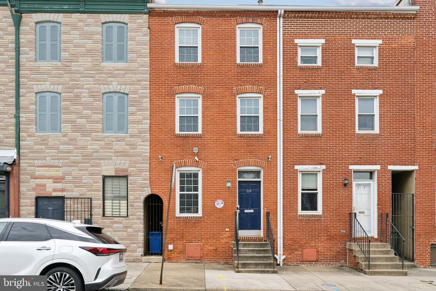 GORGEOUS 3-STORY ROW HOME ON QUIET AND SOUGHT-AFTER BLOCK NOW AVAILABLE IN UPPER FELLS POINT. GLISTENING HARDWOODS CASCADE THROUGHOUT. CUSTOM CABINETRY, LARGE CHEFS KITCHEN, TALL CEILINGS. SPACIOUS 3 BEDROOMS WITH 2.5 BATHROOMS. 3RD LEVEL FEATURES A BEAUTIFUL PRIMARY SUITE WHICH INCLUDES A WALK-IN CLOSET AND A PRIVATE DEN. TONS OF NATURAL LIGHT. EXPOSED BRICK. CUSTOM BACKSPLASH AND BLINDS THROUGHOUT. EXTERIOR HOME VIDEO SURVEILLANCE. AMPLE STORAGE. LUTRON LIGHTING SYSTEM WITH DIMMERS THROUGHOUT. ENERGYSTAR WINDOWS. FULL-SIZE WASHER & DRYER. PRIVATE REAR FENCED IN PATIO - GREAT FOR ENTERTAINING. 1 OFF-STREET PARKING SPACE AVAILABLE IN THE REAR COURTYARD. CLOSE PROXIMITY TO JOHNS HOPKINS MEDICAL CAMPUS, RETAIL SHOPPING, LOCAL DINING, FELLS POINT, INNER HARBOR, PATTERSON PARK, AND ALL MAJOR HIGHWAYS. SCHEDULE A PRIVATE TOUR TODAY.