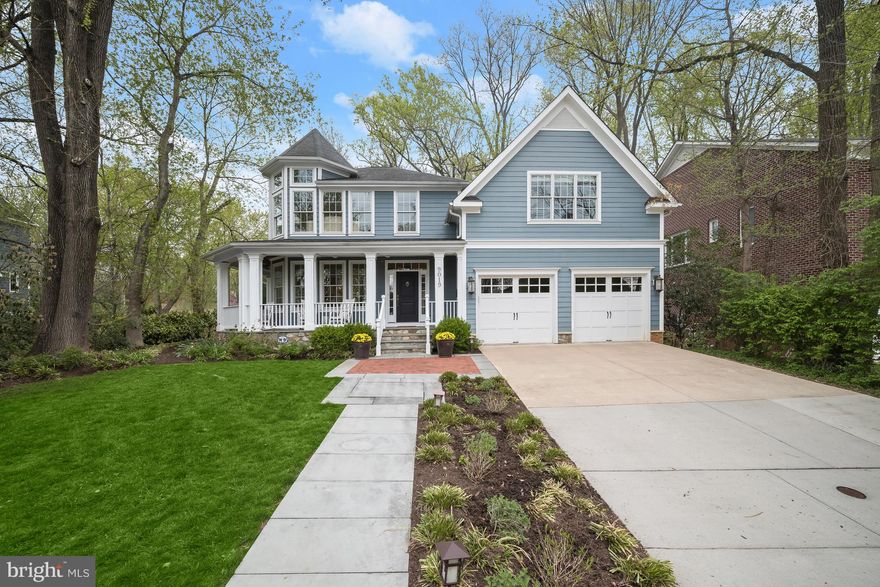 **Incredible New Price!** Nestled on a tree-lined street in Ayrlawn neighborhood, 9019 Lindale Drive showcases elegant curb appeal paired with stunning interior features and curated amenities. A Beauty, this Custom Colonial presents 5 Bedrooms, 4 Full Baths and 1 Half Bath across 3 levels and 6,386 square feet of living space, boasting Main and Upper Level hardwood floors and custom millwork, paired with designer fixtures, recessed lighting and built-ins throughout.

9019 Lindale Drive boasts a landscaped Front Yard, views of the turret feature, a driveway leading to the attached, front load 2-Car Garage, the slate front path and stone steps leading to the wrap around Front Porch, with slate flooring, wood beadboard ceiling and ceiling fans. The Entry Foyer boasts beautiful sconces, classic bell jar light fixtures and a coat closet. The Entry Foyer also leads to the Main Level Powder Room with a square console sink, designer mirror and chandelier. The Living Room showcases breathtaking windows with views of the Front Yard and access to the Side Porch. The Dining Room presents wainscoting and a bespoke brass chandelier. The Island Kitchen boasts white marble counters with tile backsplash, premium appliances, pendant lighting, warm wood counter island seating and a pantry closet. The Breakfast Area follows, showcasing display cabinets, Rear Patio access and a desk/work station with marble top. The Family Room, open to the Kitchen, showcases a coffered ceiling, Rear Patio access and a gas fireplace, flanked by recessed bench seats and windows. The Rear Hall leads to the Office and Mudroom, complete with Garage access and a coat closet. The Office offers double French door entry, a coffered ceiling, a lighted ceiling fan and Mudroom access. 

Ascending to the Upper Level, the Upper Hall, complete with a linen closet, leads to the Primary Bedroom Suite, boasting a triple window overlooking the Rear Yard, a gas fireplace, a Primary Sitting Room with a private balcony, in addition to an ensuite Primary Bath. The Primary Bath truly is a serene retreat; complete with marble tile flooring, dual vanity with marble counters, custom mirrors, 2 medicine cabinets, a make-up vanity, a free-standing tub with a handheld shower, a stall shower with marble tile flooring and a bench seat, a water closet with a Kohler toilet and bidet and 2 outfitted walk-in closets. The Second Bedroom presents French door entry, a lighted ceiling fan, light fixture and a captivating turret. The Jack and Jill style Full Bath connects the Second Bedroom to the Third Bedroom and includes octagonal tile flooring, a linen closet, square Kohler pedestal sink and medicine cabinet, a separate room with a tub shower with tiled surround and toilet and a second square Kohler pedestal sink and medicine cabinet. The Third Bedroom showcases a walk-in closet and a spherical wire chandelier. The Fourth Bedroom boasts a walk-in closet, attic access and an ensuite Full Bath, including tile flooring, a tub shower, a handheld shower head, a mirrored medicine cabinet and single vanity. The Upper Level’s offerings are complete with a Laundry Room offering tile flooring, a front load washer and dryer, utility sink and shelves.

Descending to the walk-up, newly carpeted Lower Level, the Recreation Room awaits, offering space for a pool table, TV area and more! The Fifth Bedroom includes a full window, a walk-in closet and light fixture and adjoins the Full Bath with a tub shower. The Lower Level is complete with an Exercise Room with a mirrored wall, a large, shelved, storage closet, 2 Utility Rooms, one including a sump pump and an exit to the Rear Yard. 

Backing to parkland and lined with picket fencing, the slate Rear Patio and Yard is a verdant, private oasis.

In close proximity to Ayrlawn Park with tennis courts, athletic fields and playground, the YMCA, Bradley Park and North Bethesda Middle School, 9019 Lindale Drive offers residential bliss! Schedule a visit today!