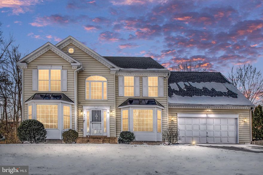 "Experience luxury living in this meticulously remodeled home at 6010 Benevolent Street, where no detail has been spared. Many upgrades, ensuring a perfect blend of elegance and modern comfort. Enter the home to a welcoming 
sun-drenched two-story foyer.  This immaculate home has an open floor plan

Step into a chef's dream with a brand-new kitchen featuring upgraded cabinets, granite countertops, and state-of-the-art appliances (4 yrs). Hardwood floors throughout the first two levels, recently sanded and refurbished, grace the entire home, providing a timeless appeal.

Enjoy the peace of mind that comes with recent upgrades, including a new A/C unit, roof, ceiling fans, and metal railings. French doors open gracefully to both the Dining Room and Living Room, each adorned with four bay windows that flood the space with natural light.

The Master Bedroom is a true retreat, boasting a spacious sitting room, a master bath with a garden tub, separate shower, and a generously sized walk-in closet. Dual stairways lead upstairs—one from the front entrance and another from the laundry room—providing convenient access to the large room above the two-car garage.

The fully finished basement adds versatility to the property, featuring a bedroom with a full bathroom and closet, (5th bedroom is Not to Code) complemented by ample windows that illuminate the space. The partially fenced backyard provides privacy and a perfect outdoor retreat.

Home offers a large main level laundry room with upgraded washer & dryer.  Two Car garage has 240 volt EV Charging with ample space for your cars and additional storage.

In summary, this home "Shows Beautiful!!" – a testament to the thoughtful design, meticulous remodeling, and attention to detail throughout. Schedule a viewing today to appreciate the true essence of 6010 Benevolent Street."