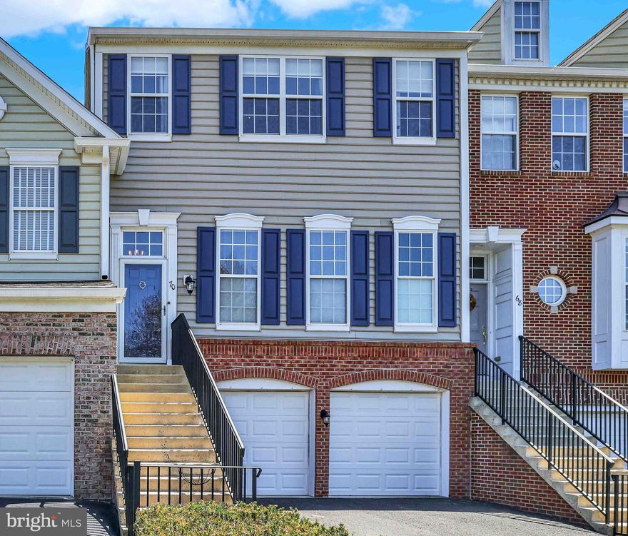 Hello Beautiful! This expanded Brandon II townhome served as the builder's model and is filled with open spaces and natural light with Mohawk Rev 7 foot, random width floors that were installed throughout the main level and follow a circular layout - perfect for those entertaining get togethers.  A two-sided gas fireplace in the Family Room (adjacent to the Kitchen) is flanked 10-foot doors separating the Home Office/ Den for utmost privacy. In the gourmet  kitchen, there are plenty of 42" brand new solid wood cabinets and granite counters, gray and white brick styled tile backsplash and new stainless steel appliances. A second story oversized deck is accessed through the sunny office.  A powder room and custom molding custom window blinds complete this level. Retire for the eve - upstairs in one of the spacious bedrooms. The master bedroom includes a huge walk-in closet with organizers, and a brand new master bathroom with double sinks, and an 8-foot luxurious shower with a shower head at each end frameless doors, and a private water closet with a new one-piece fixture. The laundry room is conveniently located on the upper level. A full bathroom is located in the hallway and shared by the second and third bedrooms that have their own spacious closets. Next we go to the lower level of the home  and find more living space. A  media room with 9' ceilings and  another spacious (4th) bedroom and another full bath - a great area for guests or au pair.  Also find access to the 2-car garage, and a large storage room and two additional closets down here. Sliders on this level lead out to a beautiful covered paver patio.  A Beauty to not miss out on!