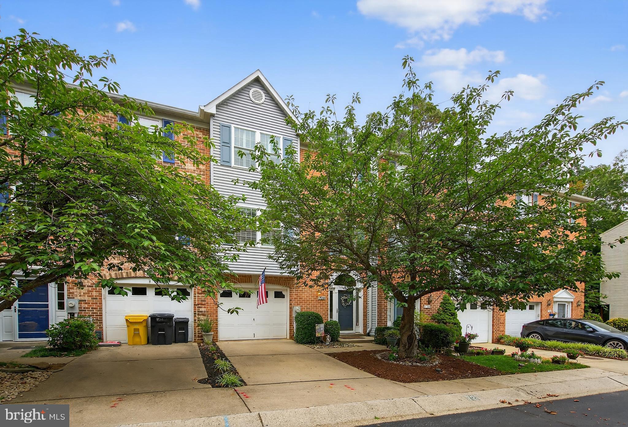 Introducing this stunning 3-bedroom, 3.5-bath garage townhome in the highly desirable Bay Hills community! This beautifully updated home offers a perfect blend of comfort and style, beginning with a fully finished walkout lower level featuring a spacious family room/possible 4th bedroom, cozy gas fireplace, full bath, and two newly added windows that flood the space with natural light—ideal for entertaining or relaxing in your private fenced backyard retreat. Enjoy brand new hardwood floors throughout the main living areas and a completely renovated kitchen (December 2024) equipped with a large island, quartz countertops, specialty cabinets, 2 level silverware drawer, cabinet with trash and recycle bins, under cabinet lighting, soft-close cabinetry with pull-out drawers, cookie pan/baking tray cabinet, a lazy Susan, stainless steel appliances, gas stove, and elegant pendant lighting. A slider opens to a spacious 20x16 deck overlooking serene wooded views. The primary suite boasts vaulted ceilings, a walk-in closet, and a luxurious ensuite bath with a double vanity, linen closet, and new walk-in shower (2025). Additional features include updated hall bath, bump-outs for extra space, replacement siding, new front door with sidelights, new gutters and downspouts (2025), plantation shutters, roof (2011) and HVAC (2019). Conveniently located near the golf course, water access for kayaking and canoeing, and just minutes to shopping, dining, Annapolis, Baltimore, and more! Bay Hills pool membership is also available. Don't miss the opportunity to call this gorgeous house your new home!
