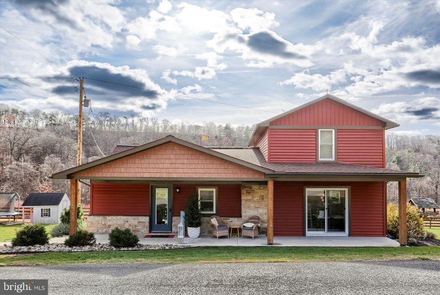 Secluded 38-acre homestead with spring-fed pond, remodeled home, exceptional outbuildings and dual road frontage. The 3-bedroom, 2-bath, 1,745 sq. ft. home was thoughtfully remodeled in 2018 and blends modern comfort with cozy, rustic charm. The custom kitchen with quartz countertops, in-floor radiant heat, mini-splits, and wood-burning fireplace make everyday living comfortable in every season. Step outside to a spacious back deck that leads to a hot tub, above-ground pool, firepit, and a 14' x 16' timber-frame pavilion—perfect for family cookouts, birthday parties, and evening gatherings under the stars.

New in 2018, a 40' x 60' bank barn offers a kitchen with 6-burner CPG commercial stove, guest quarters and radiant floor heat on the second floor. The lower level includes garage doors, two horse stalls, and plenty of room for hobbies, animals, or storage. Additional improvements include a 28' x 36' garage/shop with first-floor workspace and second-floor office/game room, run-in shed, 325-gallon propane tank, swingset, playhouse, trampoline, and windmill.

The acreage includes two enclosed hunting blinds, a stream, excellent wildlife habitat, and fishing in the pond. Approximately 700 winterberry and curly willow bushes offer supplemental income potential. 

Previously home to Lykens Valley Contractors, the property offers plenty of space for a small business, hobby farming, or multi-generational living. With its privacy, versatility, and family-friendly features, this homestead is a rare opportunity to create a lifestyle filled with outdoor living, comfort, and exciting possibilities.