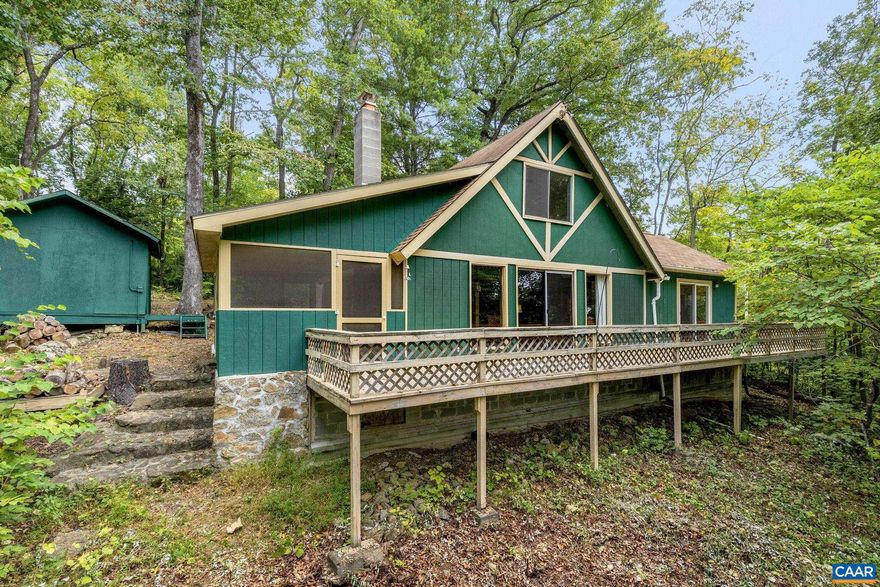 A private, mountain retreat in close proximity to the Shenandoah National Park, Rapidan Wildlife Management Area, vineyards, golf course and more! This chalet style home makes excellent use of space with a vaulted living room and large rear deck wrapping to a screened porch entry. Large, detached shed for storage. Home features a main-level primary bedroom and additional, loft bedroom. Hardwood and slate floors throughout main level. Updates include; beautifully renovated bathroom with clawfoot tub, new PEX water lines (?23) and all new insulation and vapor barrier in crawlspace (?24). Firefly fiber broadband internet available! Sitting on 3.12 acres, with winter mountain views, the surrounding property provides ample space for relaxation. For permanent living or as a vacation base for exploring, this home has much to offer!,Formica Counter,Wood Cabinets,Fireplace in Living Room