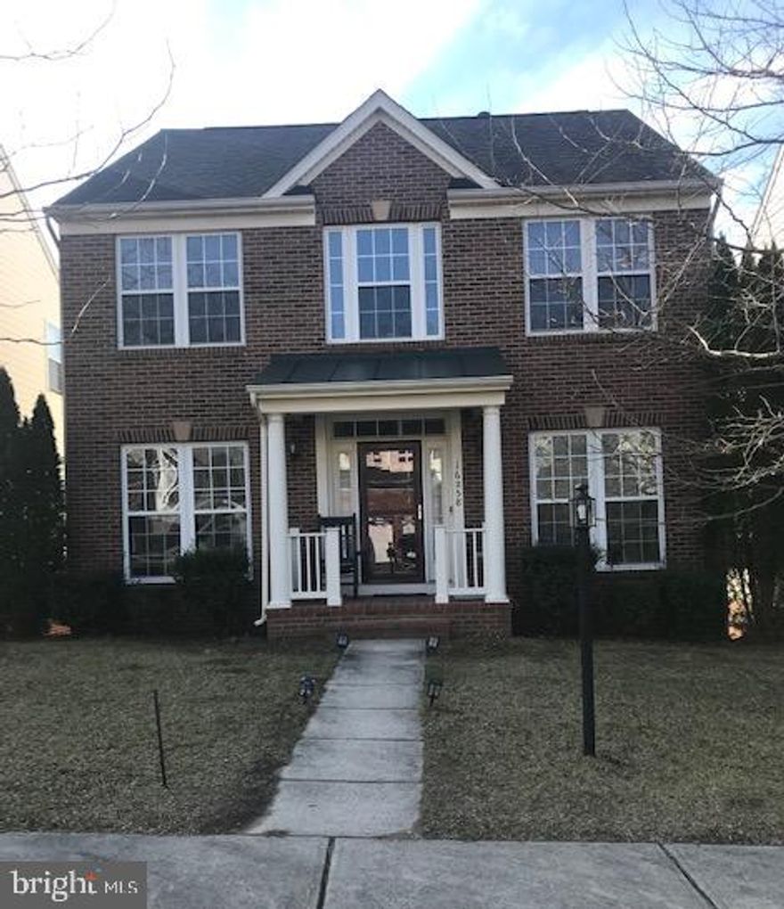 Location, location, location!!! Luxurious, brick front, 4 bedroom, 3.5 bath colonial offers approximately 3,400 sqft of living space from top to bottom. The entryway boasts beautiful hardwood floor and plenty of natural light. The main level features an office/living room, formal dining room, half bath, gourmet kitchen and family room with a cozy fireplace. The eat-in kitchen exhibits stainless steel appliances, double ovens, gas cooktop and lots of counter space. The brand new trex deck is perfect for entertaining. The upstairs encompasses four spacious bedrooms including the master bedroom, complete w/a large walk-in closet and En-Suite bath with a jacuzzi tub, separate shower and lots of vanity space. The lower level houses a large rec room, workout/potential 5th bedroom (NTC) and brand new bathroom w/marble, ceramic tile, jacuzzi tub, extra large shower and vanity. Close to I-95, Quantico, Fort Belvoir, VRE, commuter lots, shopping and entertainment.