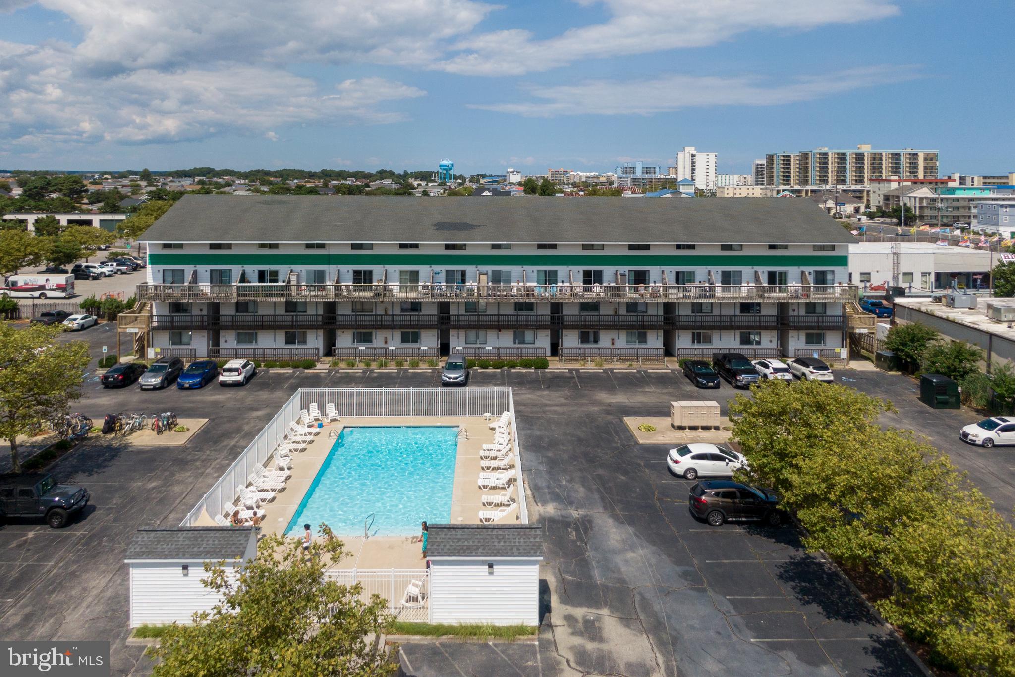 Lovely, TURN-KEY prime location TOP FLOOR end unit sold fully furnished. 1BR One bath split level condo with upgraded Pergo flooring. Freshly painted, Washer/Dryer, New custom doors throughout this two level unit with great views of Northside park (4th of July fireworks!) Up the spiral staircase is the large bedroom with fully upgraded bathroom also extended for extra storage and larger closet. These END UNIT condos have a larger floorplan with extra newer windows bringing in Natural light throughout the unit. Water views from the bedroom window. The mini-split heat pumps are new with a 10 year warranty. Fully equipped kitchen with all modern appliances and extra breakfast bar built-in for more seating. Raffles condominium is located in quiet North Ocean City, just steps to Northside Park and two short blocks to the Ocean, One block to Restaurants Shops, Grocery, Donuts, Bagels and many other food stops. Other features include - Large Outdoor Pool, Private Balcony, Private Parking and plenty of street parking available. 332 Raffles is owner's second home and has been meticulously maintained. Raffles condo has Great Rental Potential for investors with GRI average of 22-25k per season.