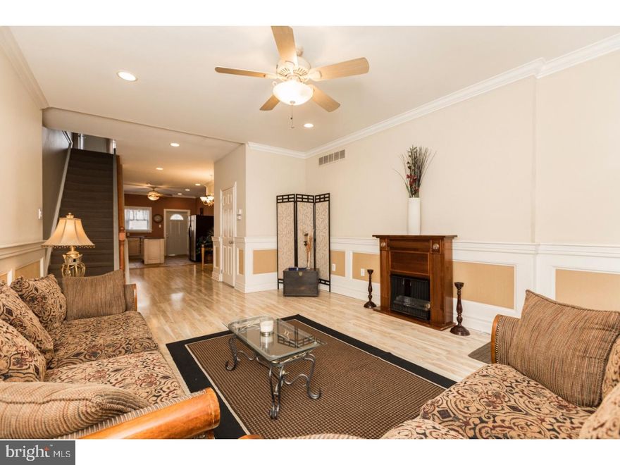Welcome to 2703 E Somerset st, a lovingly maintained 3 story row home that is situated on a great block in the burgeoning neighborhood of Port Richmond. Featuring 3 bedrooms, 1.5 baths and 2,100 sq ft of living space, you'll have plenty of room for a large or growing family. The beautiful and unique stone facade provides tremendous curb appeal and stands out from the neighboring brick and stucco front residences. Upon entering the home you will immediately notice the wide open layout with a straight-through living room, dining area and kitchen along with the ultra convenient powder room that make up the first floor. The space is highlighted by charming two-tone wainscoating, decorative fireplace, and abundant natural light from the above-door transom and over-sized front window. Access to the rear patio/yard through the kitchen where you'll have plenty of space for grilling, entertaining, or starting your backyard garden. On the second floor there are two large bedrooms, each receiving great natural light and ample closet space. Also on the second level is spacious hall bath with twin sinks, soaking tub, and stall shower. The master bedroom is enormous and takes up the entire 3rd floor and also feature built-in wardrobe with vanity. Full finished basement with wall to wall carpeting, laundry area, and plenty of space for storage. Located a stone's throw from Taconelli's Pizza, The Hinge cage, Bait'n Switch as well as the many other great attractions Port Richmond and Fishtown have to offer. Schedule your visit today!