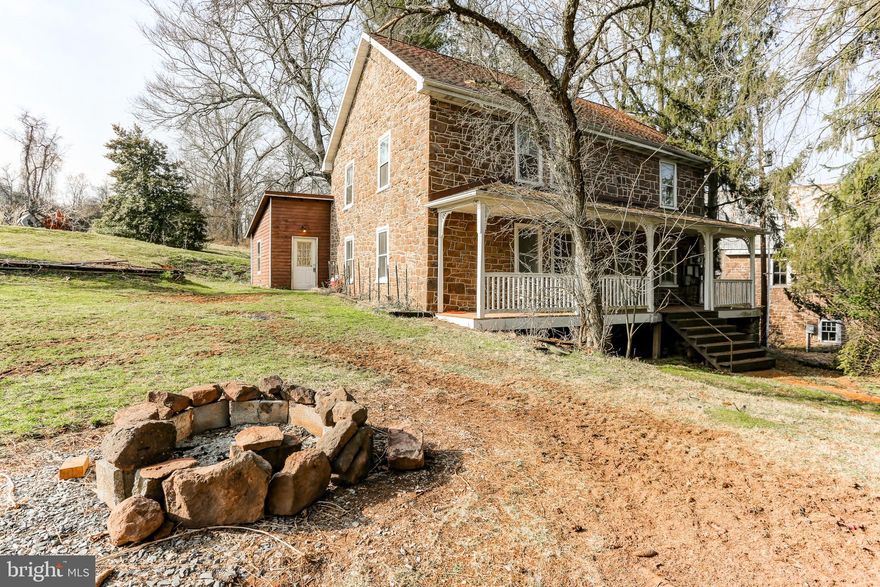 Nestled just outside Lewisberry Boro, this Historic 1764 Farmhouse has 4 Bedrooms and 2 1/2 Baths. Upstairs has all 4 Bedrooms and both full baths. Main level has a Country Kitchen, Dining Room, Living Room and Family Room. Two Staircases as home was previously divided. A spacious Vestibule holds the Washer/ Dryer and Wood Stove that remain with the home. The Farmhouse sits on 26.5 rolling acres of Fields for Crops and Pastures. A 5 Stall Stone Barn and tack area is 71 X 31, with a 7 ft overhang and an additional 30 X 25 wood add -on Storage structure. There is also a Large 72 x 40 Aluminum Pole Barn, totally open inside so it can be used for anything. Property is in the Clean and Green Tax Program and has endless possibilities! Just needs your TLC! Property is being sold in "As In Condition".  Auction of Farm Equipment and Household Furniture is April 29 at 9 am.