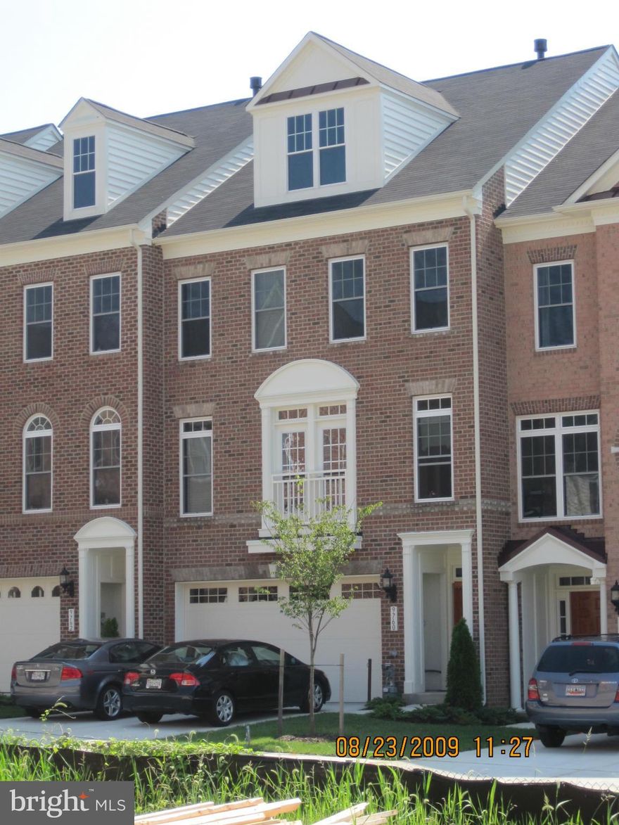BEAUTIFUL, SPACIOUS, IMMACULATE TOWNHOUSE READY FOR IMMEDIATE MOVE-IN TODAY!  This townhouse features all new paint and carpet, true hardwood flooring throughout main level, gourmet kitchen with high-top, stainless steel appliances, huge master bedroom w/walk-in closets, master bath with soaking tub, double vanity, fully finished basement, in very quiet community.  This townhouse won't last long!!