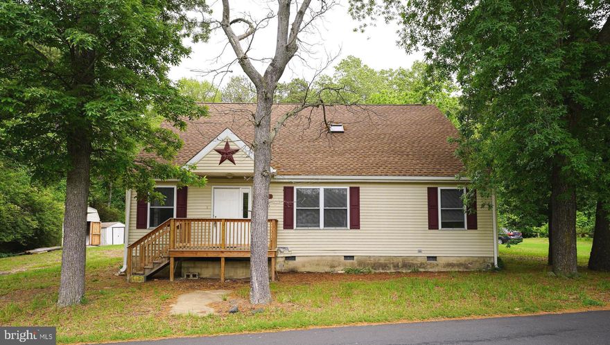 Rare find on 2.9 Acres in Mardela School District -- Updated and upgraded - 4BR + Office + Loft, 2.5BA. New Roof on house + garage, new LVP flooring throughout, new ceiling fans and fixtures, fresh paint, new appliances, new bathrooms, new oversized deck. Flexible floorplan offers wide open spaces and plenty of room for everyone! Great room and dining room w/tons of natural light. Dreamy kitchen w/crisp white cabinetry, new stainless steel appliance package, new upgraded granite counters, island. 1st floor primary bedroom w/sliders to the deck, full, en-suite bathroom - tile-surround shower, LVP floors, 2 sinks. Flex room w/closet on the 1st floor could be a guest room, study, home office. Half bath and nice-sized laundry room - including washer + dryer - completes the 1st floor. Up the wide stairway - large loft area w/skylights + ceiling fan offers another flex space, and separate living area. 3 additional bedrooms - LVP floors, new ceiling fans, walk-in closets. 2nd full bath w/tile surround tub/shower combo.  Enjoy the outdoors on your new oversized deck - plenty of cleared yard + wooded acreage. Private, country feel, but just 5mi to Rt 50. Centrally located to shopping, dining, events - just south of Sharptown - about 10mi to Laurel, Delmar, Vienna, 12mi to Downtown Salisbury. Call today to make this your new home!  Sizes, taxes, distances approximate
