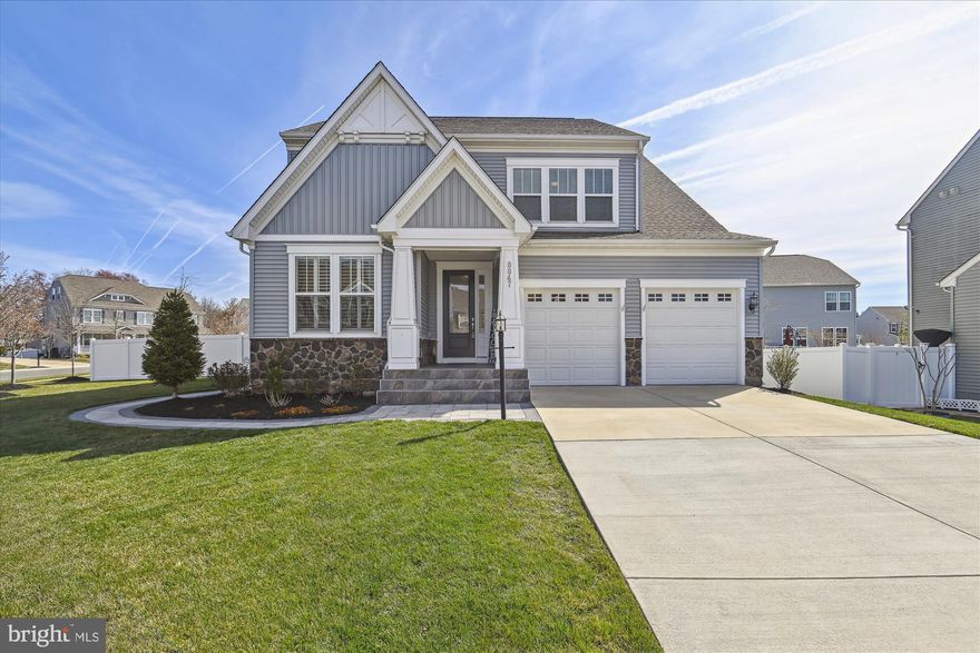 OPEN HOUSE CANCELED - UNDER CONTRACT.  
A PERFECT 10! Welcome home to this meticulously maintained Craftsman home with 5 bedrooms and 3.5 bathrooms seated on a large quarter acre lot! The curb appeal of this home shine with a perfectly manicured lawn and beautiful landscaping.  You will love the covered entryway as you enter into the large foyer.  The natural sunlight in this home is fantastic! The showstopper is the wide open floor plan  - a huge kitchen island that is the heart of the main level. The kitchen is a true gourmet kitchen with upgraded cabinets, premium counters, custom backsplash, stainless steel appliances and space for a dining table. The family room has a fireplace, large windows with plantation shutters and opens up to the large backyard. Also on this level is a private home office with glass french doors.

Upstairs is a large landing and four generously sized bedrooms. The primary bedroom has a large walk-in closet and the primary bathroom that is luxurious!  For added convenience that any owner would love - the washer and dryer is on the upper level! 

The lower level is a walk up and has even more natural light!  The large fifth bedroom and full bathroom is the perfect space for guests.  In addition to the large den in the lower level, the owners have transformed the unfinished basement into a great gym space! 

The backyard is large, flat and  fully fenced! The owners added a stone patio and walkway off of the all weather deck - a perfect spot of outdoor dining and entertaining!

Easy access to commuter routes, shopping, dining and Old Town Manassas. Come visit us at the open house!