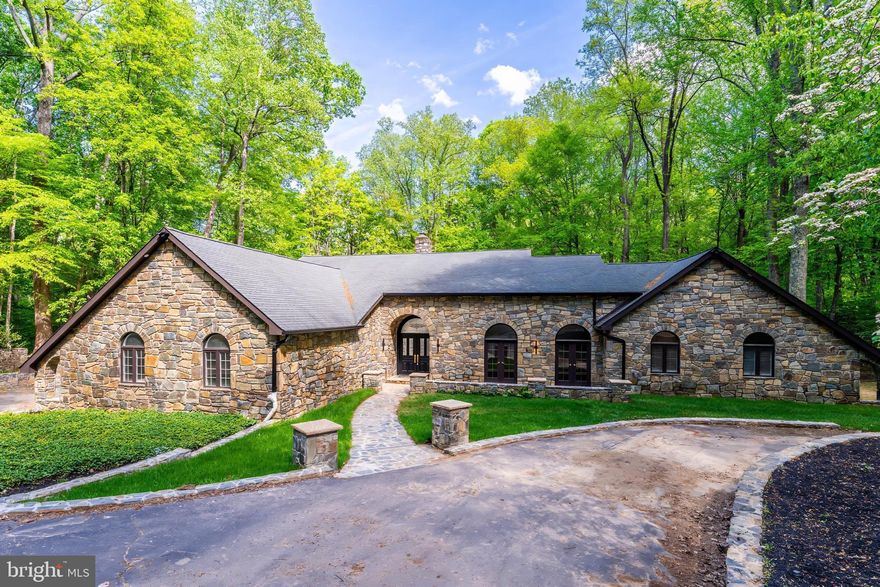 Exceptional 5 acre estate in the coveted Southdown neighborhood of Great Falls. This completely renovated home features a stunning stone front facade, offering unmatched privacy and luxury. Inside, enjoy top-tier amenities including a gourmet kitchen, private gym, and space for a home theater — the perfect blend of elegance and modern living.