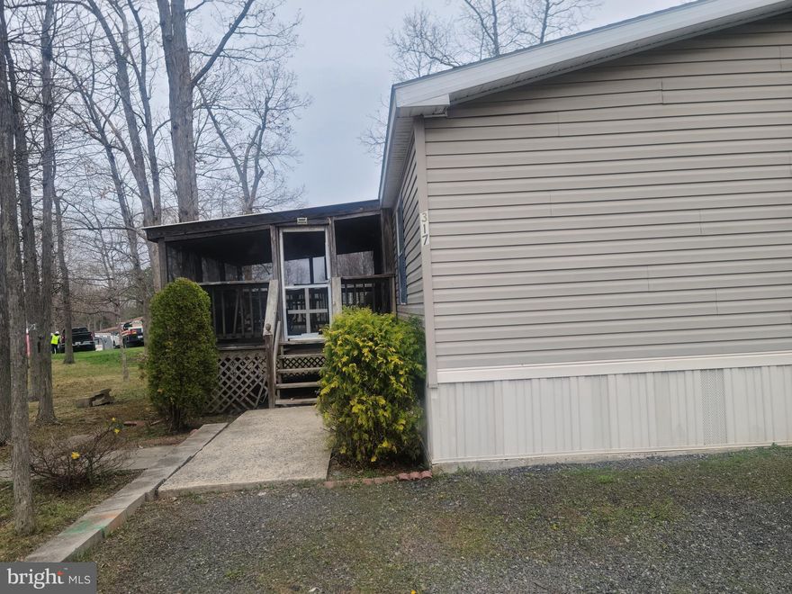 Bag a bargain for this 3BR 2BTH modular home in Richland Meadows. Cathedral ceilings, walk in closet in each bedroom, covered screened porch, storage shed and more.   Nice setting with tall trees and ample parking area. Monthly fee $625. includes trash, water, sewer, common area. Just needs some minor cosmetic improvements.