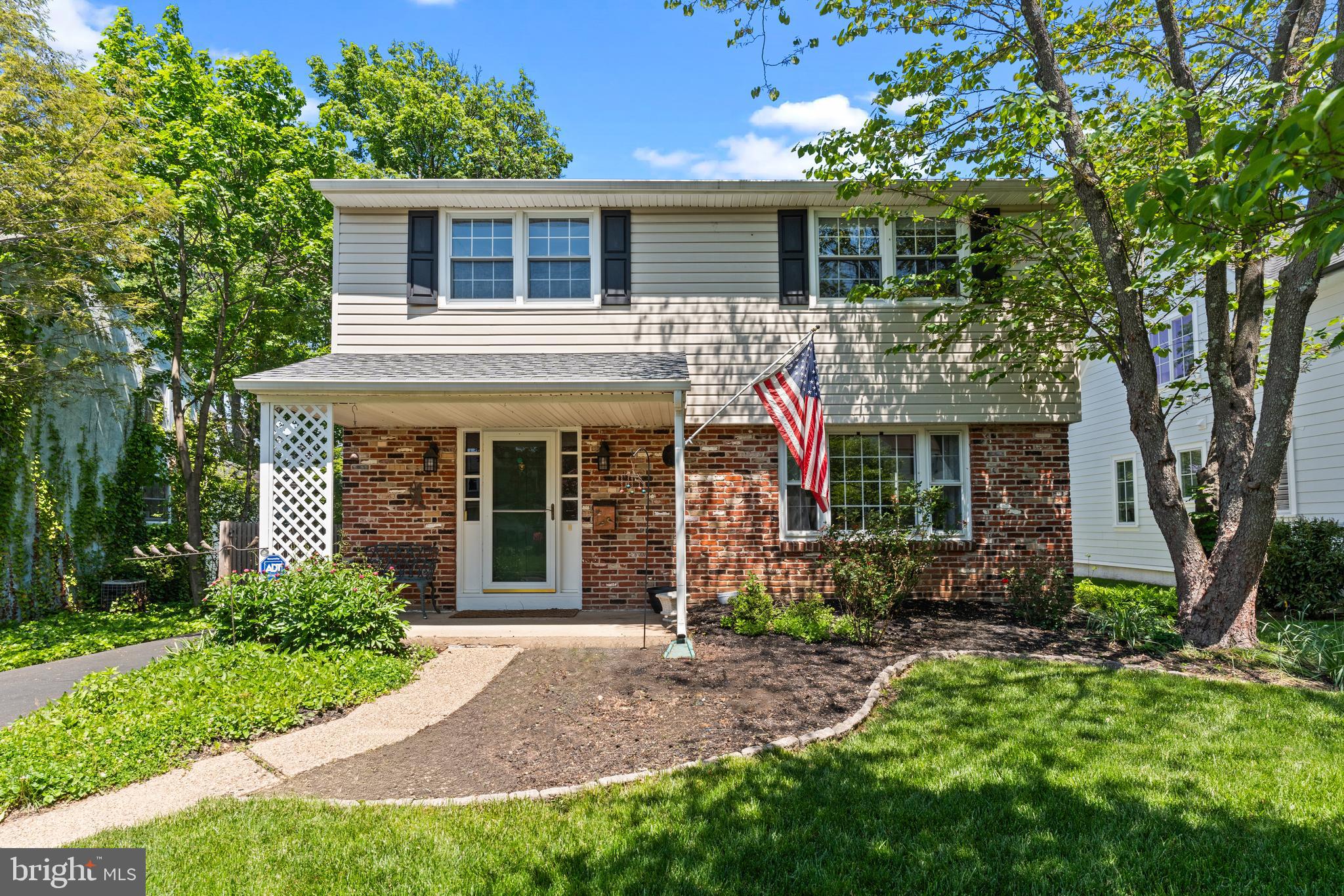 AMAZING OPPORTUNITY to own this pristine single-family colonial home in historic Newtown Boro! Just a few blocks from shops, eateries, and professional services, this residence awaits at a price you cannot believe for this sought after location! The covered front porch welcomes you into a turnkey property featuring hardwood floors and bright sunny rooms! The entry hall opens to the adjacent living and dining rooms -- the perfect setting for everyday living and entertainment. The updated kitchen offers desirable white cabinetry, granite counters, breakfast bar, and separate dining area for family gatherings. The kitchen is the heart of this home overlooking the huge family room. This open concept seamlessly connects the rooms and at the same time brings the outdoors inside with great backyard views! The upper level offers generous bedrooms, hardwoods floors, an updated hall bath, and a primary suite with a walk-in closet and a renovated ensuite bath! The fabulous backyard with paver patio is great for outdoor barbeques, sunbathing, and relaxation. Fully fenced, it is pet friendly and is also a great place for a swing set and/or garden! Off-street parking for several cars adds convenience while the full basement provides additional finished space and ample storage! This property offers immediate occupancy and endless possibilities to make it your own in a prime location where walkability is a ‘10!’ Small town everyday life will be a dream come true, and commuting is a breeze with easy access to Princeton, New York and Philadelphia!