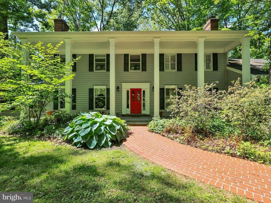 Discover unparalleled tranquility at 9204 Falls Bridge Lane, nestled within quiet Potomac Station. This remarkable residence, privately set back on over 2 lush wooded acres, offers a serene escape with its own picturesque pond and cascading waterfall. A grand circular driveway welcomes you to this spacious 4000+ sq ft home, featuring a two-car garage. Inside, multiple fireplaces create an inviting ambiance, complementing the expansive living spaces. The property boasts a captivating creek meandering through its lower back yard and sprawling grounds perfect for outdoor enjoyment. Explore enchantment with private trails weaving through a woodland garden. The huge finished basement, complete with a full bath, provides versatile living options. Enjoy outdoor gatherings on the large deck or find a quiet moment on the second-floor balcony. A generous front seating porch offers another charming spot to relax. This exceptional property combines luxury, nature, and privacy, offering a truly unique living experience.