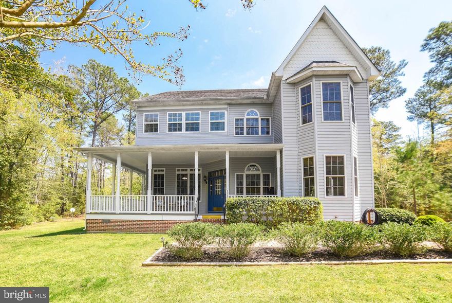 Beautiful and turn key colonial on 8.00 acres!!  3/4 bedrooms and a separate office area with built in shelves.  Bedroom and a full bath are on the main level.  2 fireplaces one has a woodstove insert.  Beautiful wrap around porch as well as another porch off the family room.  Hardwood floors thru out with tile floors in the bathrooms.   Lots of sq. footage here.  Hugh master bedroom with a fireplace.  Private location!!  No HOA.