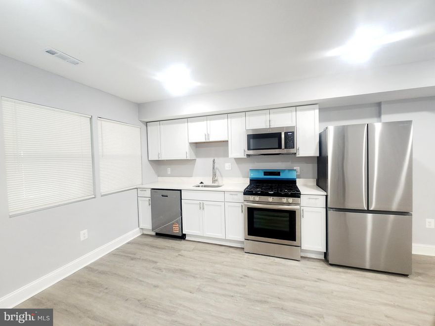 Welcome home to your updated 4-bedroom, 2-bathroom brick townhouse nestled in the heart of Baltimore’s sought-after Better Waverly neighborhood. This home combines classic charm with modern upgrades, offering comfort and convenience in an ideal location .This property is just minutes away from Johns Hopkins University, MedStar Union Memorial Hospital, Clifton Park, and Lake Montebello. With easy access to public transportation and major highways, making  commuting  a breeze. Step onto the inviting covered front porch, perfect for morning coffee or evening relaxation. Inside, the spacious layout features a bright living area that flows seamlessly into a well-appointed kitchen with granite countertops and stainless steel appliances. The fully finished basement provides additional living space, ideal for a family room, home office, or guest suite. At the rear, a sunroom offers a tranquil retreat, bathed in natural light, overlooking the backyard. This home presents an exceptional opportunity for homeowners and investors alike. Don't miss your chance to own this charming residence in one of Baltimore's most desirable neighborhoods. Schedule your showing today