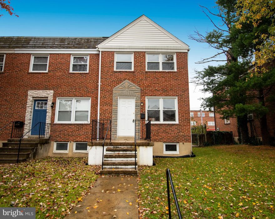 Great opportunity to own this updated large end of group town home with hardwood floors throughout. Spacious living room, separate dining room and kitchen with tile back splash and gas cooking. Upper level has full bath with tile floors and tile tub/shower combo, 3 bedrooms, all with ceiling fans and closets. Lower level unfinished with plenty of space for storage or ready for you to finish, flush, laundry area with laundry tub, washer and gas dryer and door with access the backyard.  Large fenced rear yard with parking.