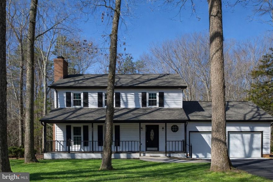 A gem completely renovated with over an acre and fenced in backyard ready for you. This renovated property offers 3 bedrooms, 2.5 baths, and 2,104 square feet, 2-car garage and perfectly positioned on 1.15 acres with mature trees and a large, fenced yard.
A covered front porch welcomes you into the foyer, where an L-shaped staircase and coat closet create a functional and inviting entry. To the left, the formal living room features a wood-burning fireplace with mantel, ceiling fan, chair railing, and crown molding, all complemented by hardwood floors that extend throughout the home. The living room flows seamlessly into the formal dining room, also accented with chair railing and crown molding, and highlighted by French doors that open to a bright sunroom with tile flooring, oversized windows, and direct access to the backyard and deck.
The kitchen is accessible from both the dining room and foyer, with a conveniently located half bath along the way. Designed with both style and function in mind, the kitchen features white cabinetry, subway tile backsplash, quartz countertops, stainless steel appliances, display cabinetry, a deep metal sink, and a walk-in pantry. Direct access to the attached two-car garage adds everyday convenience.
Just off the kitchen, a versatile room with skylights, a wood ceiling, and ceiling fan offers the perfect space for a family room, home office, or potential fourth bedroom.
Upstairs, the primary suite is thoughtfully designed with chair railing, crown molding, and a ceiling fan, along with an en-suite bath featuring dual vanities, a walk-in closet, and a separate water closet with a walk-in shower with glass doors and tile surround. Two additional bedrooms with closets complete the upper level, along with a full hall bath with tile flooring and a tub/shower combination. A hall laundry closet with LG front-loading washer and dryer and built-in shelving adds convenience.
Outside, enjoy a large, fenced yard surrounded by mature trees, offering both privacy and space for outdoor living, entertaining, or play. In addition to the attached two-car garage, a detached shed/garage located off the asphalt driveway provides excellent storage for lawn equipment and tools.