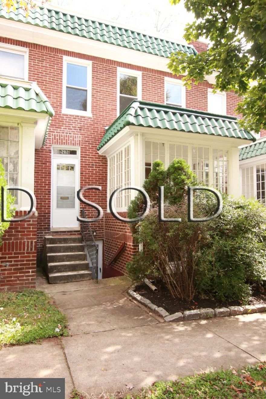 This 4 BR, 2 BA rowhouse in Charles Village is filled with authentic charm and is close to the BMA, R House and Hampden! It?s perfect for a buyer who is looking to own a house and rent the lower-level apartment or for an investor who wants a true, two-zoned unit, two electric-metered property with three entrances for easy tenant access and mutual privacy. The stunning sunroom with fresh wainscoting adorns this home and fills it with the most beautiful and warm western light. This could be a great studio, a cozy reading nook, or a perfect place to relax and enjoy a cup of hot chocolate! The large living room has a French door that leads to the sunroom, along with elegant, walnut-inset hardwood floors. The dining room is spacious and offers track lighting that?s ideal for reading or for highlighting artwork. The kitchen, featuring a new refrigerator and new stove, has a pretty glass backsplash, along with brushed nickel finishes. Upstairs, the capacious primary bedroom has two closets and is so full of bright light! Take a shower in the bathroom while also being bathed with sun from the skylight! The apartment with the fourth bedroom in the basement has been repainted, and new carpet was installed in 2020, with the full bathroom having been fully remodeled early this year. Add a stove and a fridge and have a perfect apartment with its own entrance in front! There is a door separating the basement apartment from the laundry area (giving the basement tenant interior laundry access), and this area is accessible by the main level tenant from an outside, rear entrance. The backyard offers areas to garden and is surrounded by a privacy fence, ideal for gardening, play or pets. Some of the awesome improvements include: new refrigerator (2020), new oven (2020), remodeled basement bathroom (2020), new carpet and painted basement (2020), new front baseboard heater in basement (2020), rubber roof recoated (2020), new French drains and sump pumps (2019 and 2020), fresh exterior paint (2019), reglazed tub (2019), stripped, reglazed and repainted porch doors (2019), newer kitchen roof (2019), newer washing machine (2018), stripped and repainted radiators water heater (2017), newer windows in basement and front bedroom (2017), upgraded kitchen counter and backsplash (2017), water heater (2016). Part of Charles Village Community Benefits District (see Facebook page). As is sale. Plenty of parking on 29th St. Parking lot in back is for apartments. Zoned parking on Howard St. Sellers have parked without issue  in alley behind house for short periods or when contractors needed to park.