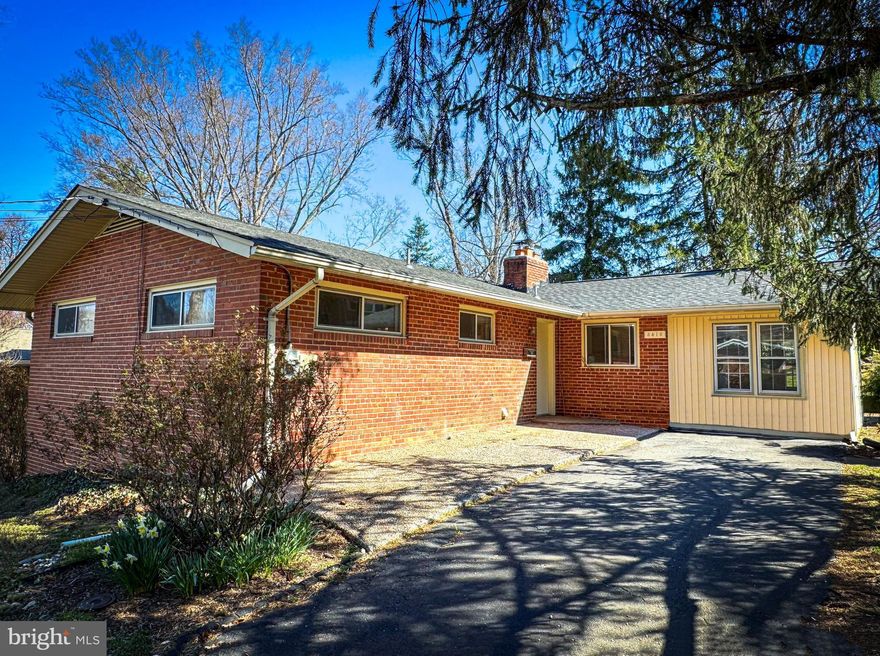 NEWLY RENOVATED THROUGHOUT- MOVE IN READY!  PRICE SLASHED $30K - Don't miss out! Brick front rambler with 4BR, 2 full baths, finished walkout basement and cozy sunroom addition. Open floorplan  with lots of windows and light. Freshly painted throughout. Gleaming Hardwood floors main level. New LVP flooring on the lower level. All baths remodeled.
Cozy brick Fireplace in FR.  Brand new kitchen includes quartz counters, stainless steel appliances, tile backsplash and white cabinetry. Fully finished lower level with 4th Bedroom, full bath, 2nd fireplace and convenient walkout door to beautiful yard and patio. Super convenient to shopping, metro, dining, great schools, and i66 and routes 50. Amazing location, friendly neighborhood and main level bedroom. Hurry!