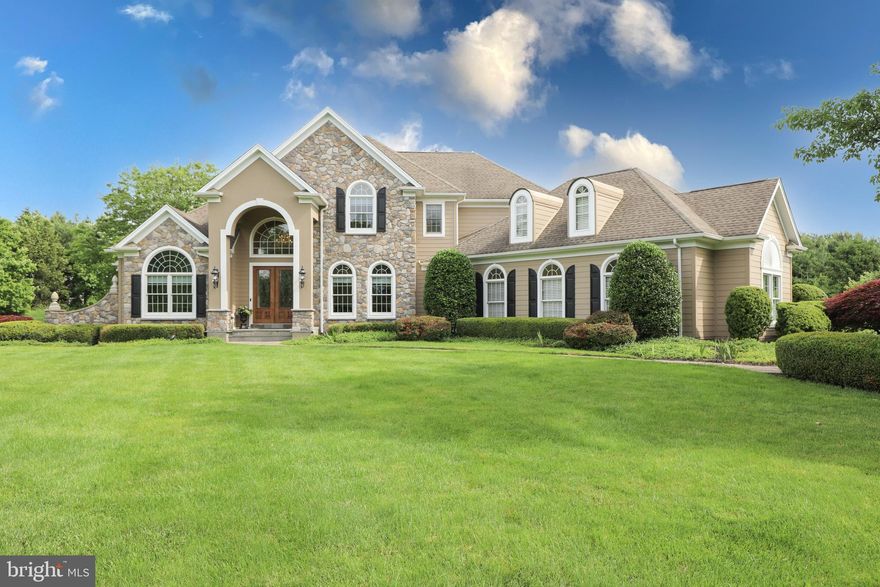 If you are considering a move, this exceptional property is waiting for you. Not only is it a beautifully crafted custom home but is located in one of the most sought after communities in Bucks County. Welcome to LONGMEADOW right here in the heart of Upper Makefield Township, Bucks County PA! Without doubt, this is no ordinary home. Set on just over1.63 acres, the French Country elevation is so appealing and can't really be found many places around out area. The James Hardie siding, custom stone accent pillars and overall architectural design is certainly captivating. Step inside the foyer entrance with 20ft ceilings, custom archways and glistening hardwood floors. To the right of the foyer is the living room and on the left is the dining room. Continue straight from the front entrance and enter the large great room complete with walls of windows, propane gas fireplace and vaulted ceiling. Perhaps the most enjoyed room in any home is the kitchen, 9 Longmeadow Drive is no exception. It has a large center island, granite counters, premium appliances, custom back splash, hardwood floors and breakfast room. A French style sliding door exits to the paver patio from the breakfast room. Another special feature offered at 9 Longmeadow is the first floor primary bedroom suite with very large closet and custom bathroom. The study is also on the main floor as is the laundry room. Upstairs are 3 additional bedrooms one is en-suite and the other two share a bathroom. The lower level is nicely finished with plenty of space for games and fun. There is home theater room and lots of unfinished storage too. Council Rock School District and easy commutes to NJ, NYC and Philadelphia. Why not move to Longmeadow today!!