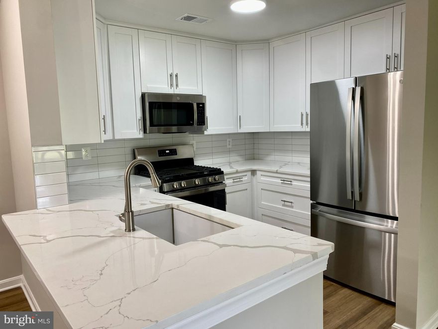 freshly renovated. New Windows, New HVAC system, besides new kitchen,  bathrooms, floors and paints,

After parking in front  of building lot #2053, walk on right side walkway of building, and you can enter 1st floor units from the rear of building, this way you can avoid going up and downstairs.