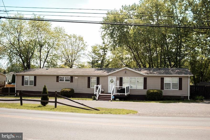 Welcome to your next home or investment property. Priced to sell!! This Large 4-bedroom, 2-bathroom modular home sits on half acre of unrestricted land, offering endless possibilities- RV Parking, gardening, animals, and so much more.  Bring all your chickens!
Enjoy the front porch and spacious back deck, perfect for winding down in the evening. The driveway provides plenty of parking and there is a shed in the back providing space for storage or yard equipment. Conveniently located just minutes from I-81 and Route 9, 15 minutes to Shepherdstown, 30 minutes to Winchester VA, and 30 minutes to Hagerstown MD, making your commute and travel convenient. 
Don't miss this opportunity to own a piece of land with freedom and space to grow!! Whether you are looking to settle in or start something new, this property is for you!!