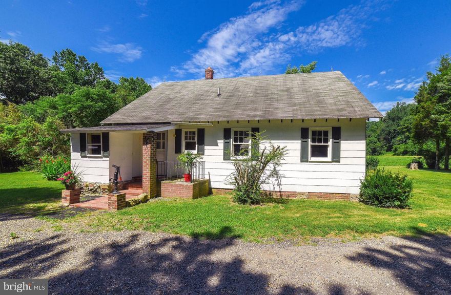 Enjoy some  peace and quiet ! Farmette with 12 acres. Perfect for Horses. Farmhouse Cottage with 3 bedrooms,1 bath. Barn and out buildings. Sold AS IS