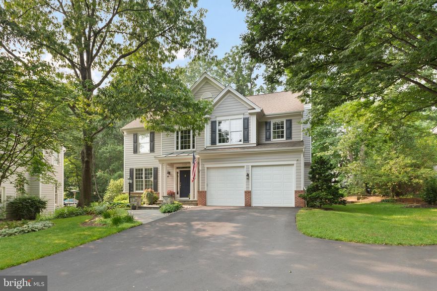 Fabulous single single-family home in desirable Wescott Woods of North Reston!  This Devon model with sunroom bump-out is sure to please the most discerning buyers.  It has been completely updated throughout the years with gorgeous sand-in-place hardwood floors throughout the main and upper levels.  The kitchen has been reconfigured and renovated, offering upgraded cabinetry, granite countertops, tile backsplash, under-cabinet lighting, top-of-the-line appliances, a breakfast nook with bench seating, and a sliding glass door to the amazing backyard!  The separate living room and dining room over great entertaining space, The family room off of the kitchen has a stone gas fireplace, and the attached sunroom has a beautiful arched entry and reclaimed wood beamed ceiling with walls of windows.  Upstairs you will find a gorgeous primary suite with two walk-in closets and custom window treatments.  The primary bathroom has been upgraded and has a large tiled seamless shower, soaking tub, and dual vanities.  The laundry is on the bedroom level.  The other three bedrooms share a hall bath with two sinks.  The lower level has space for a rec room, workout area, craft area/office, workshop, and full bathroom. Outside there is a low-maintenance deck, koi pond, lush garden, and firepit area.  Garage offers Tesla and BMW electric chargers.