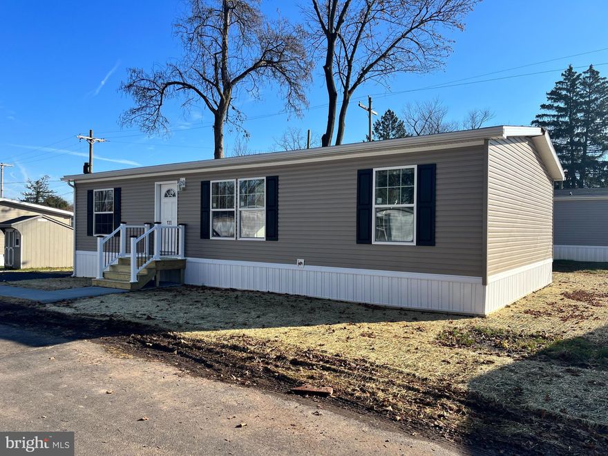 Come see this amazing manufactured home. Ranch style three bedroom with upgrades in the kitchen it’s built to last. With a sliding glass door going to the rear yard and a nice sized deck to enjoy outside space. The home features 2× 4 exterior walls and sheetrock throughout the home.  The master bedroom is large with an oversized master bath that features a walk in corner shower. Built with the open concept this home has it all. Central air is included along with a one year factory warranty.New 2 car driveway, steps, gutters and a shed all included. The pictures are during construction and the home will be completed soon.