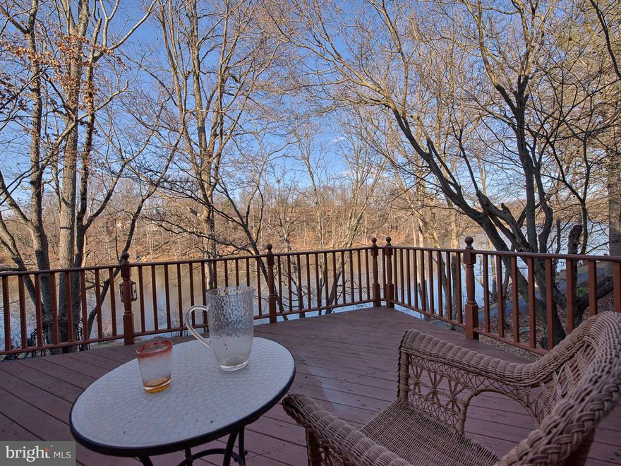 Wow! Great townhome on a wooded lot and set on Lake Churchill! With these fantastic views, you'll think you're at a lake resort--yet in a great commuter location! Enjoy entertaining on the beautiful deck and patio or walk down to the lake! Over 2,800 square feet w/finished walkout basement. Great features: spacious, light-filled rooms, hardwoods, gourmet kitchen w/stainless appliances!