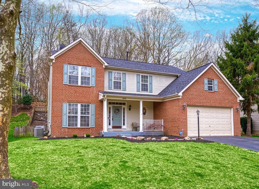 Nearly 4,000 square feet of finished space! This 4-bedroom, 3.5-bath Colonial in the desirable Ashland neighborhood offers a great balance of community amenities and a private backyard backing to parkland.

The updated interior features a grand two-story foyer with a wide staircase and hardwood floors throughout the main level. The formal living and dining rooms are bright and inviting, with natural light streaming from front to back. The spacious gourmet kitchen boasts a long center island, ample cabinetry, and flows into the sunroom—now used as the family dining area. The open-concept family room has a gas fireplace, and large windows. The seamless connection between the kitchen, family room, and sunroom provides easy access to the beautifully landscaped backyard with a paver patio. The fully fenced yard offers a peaceful wooded view.

A large mudroom/laundry room with storage cabinets connects the garage to the main living area. Upstairs, the luxurious primary suite features a vaulted ceiling, an updated bathroom with custom tilework, a glass-enclosed shower, a soaking tub, and an oversized walk-in closet with a full window. Three additional spacious bedrooms and a renovated hall bath complete the upper level.

The lower level includes a large rec room wired for surround sound, and a bonus room being used as a 5th bedroom, a third full bath, and additional storage space. The garage has also been upgraded with a GarageTek system. The roof was replaced in 2021.

Ashland offers a community pool, tot lot, tennis/pickleball and basketball courts, and a fitness center. HOA hosts many social events as an example, there was just a bingo night and an Easter Egg Roll in a couple weeks. Conveniently located just a few miles from shopping and major routes, this home is a fantastic opportunity in a sought-after neighborhood. OPEN HOUSES: FRIDAY, 04/11 FROM 4-6 PM and SATURDAY, 04/12 NOON-3 PM.