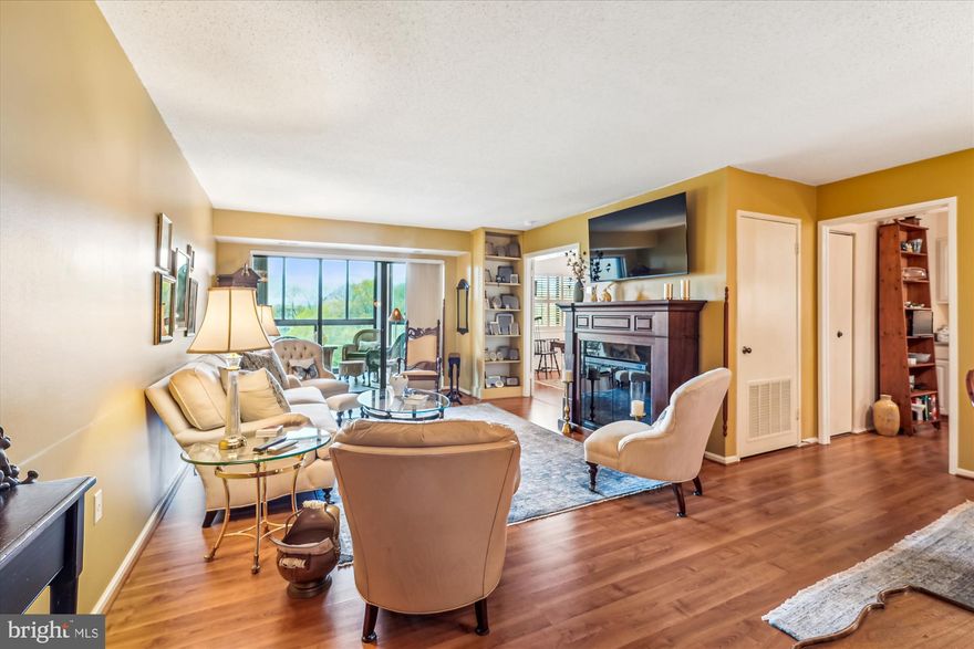 OFFERS ARE DUE MONDAY 4/21 AT NOON.  
TOP OF THE WORLD!  The view is only part of what you get in this beautifully appointed and lovingly cared for 2 bedroom 2 bath "F" model.  Vinyl Plank floors, upgraded cabinetry and six-panel doors throughout, Updated Kitchen and Baths, Custom Shades in SunRoom  and  blinds in the Bedrooms.  Underground garage space (#17) + golf cart space + 2 private storage rooms and a cage.  This is a MUST SEE condo!
 Enjoy the Natural Beauty of Leisure World. Have an active lifestyle - the community offers with 2 Clubhouses, 3 Restaurants, Indoor and Outdoor Pools, Fitness Center, Library, Theater (for Movies, Lectures, and Entertainment ), Art & Photography studies, Miles of walking paths, and so much more....