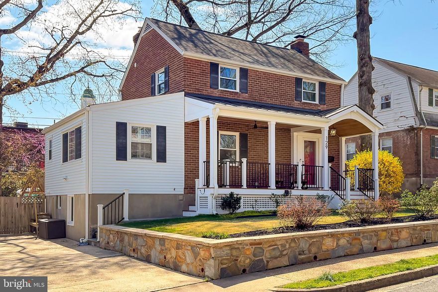 Charming Colonial on a Picturesque Tree-Lined Street – Welcome to this stately home, perfectly situated on a serene, tree-lined street with a beautifully hardscaped walkway leading to a classic front porch. Offering an ideal blend of timeless charm and modern upgrades, this home provides exceptional versatility for a variety of living needs. 
Step into the expansive living room, featuring built in shelves and a cozy fireplace that invites relaxation. Adjacent, the elegant dining room seamlessly flows into the open-concept kitchen, complete with luxurious Quartz countertops, custom cabinetry, and top-of-the-line stainless-steel appliances. French doors open to a flexible space on the main level, perfect as a bedroom or family room, complemented by a convenient powder room.
Upstairs, you'll find a beautifully remodeled full bathroom and three bedrooms, each with ceiling fans and natural light. The lower level boasts a generously-sized recreation room with recessed lighting, built-in shelves, and additional storage. The finished laundry and storage room provide convenience, while the den/office offers a quiet retreat, along with a full bath and a walkout exit to the backyard.
Enjoy peaceful outdoor living on the fantastic screened porch, which overlooks the fenced rear yard, ideal for entertaining or relaxing. The large storage shed, playground set, and synthetic grass complete the backyard oasis.
Additional features include a two-car driveway, as well as plenty of street parking for guests. The home is ideally located just one block from the Lubber Run Amphitheater and within a few blocks of the Lubber Run Recreation Center. Commuting to Washington, D.C., the Pentagon, and National Airport is effortless with easy access to Route 50. Plus, you’re less two miles from Ballston Metro, surrounded by a vibrant selection of restaurants, shops, and entertainment.
This is a rare opportunity to own an elegantly updated home in a sought-after community. Don’t miss out!
