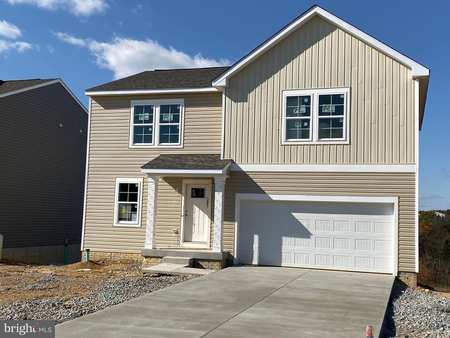 READY FOR MOVE-IN! This amazing new and affordable Whitehall II floorplan -  this completed home offers 4BR, 2.5BA, on an unfinished basement with 2 Car-garage and includes a deck Overlooking great view of semi-private walkout yard backed by trees! Ready to go with nice options like  SS appliances and  granite counters in upgraded island kitchen!  Must see your new home before someone else does! New design  features efficient 2x6 construction with top of the line name brand Lennox Central HVAC 14 SEER EQ! Live in  Berkeley County's Newest Community Overlook at Riverside just seconds from I-81 for an easy commute and conveniently located minutes from shopping, dining and entertainment! Setup your time for a tour today! Welcome home to the Heritage Series-easy, elegant and affordable. This home will sell soon - make it yours!